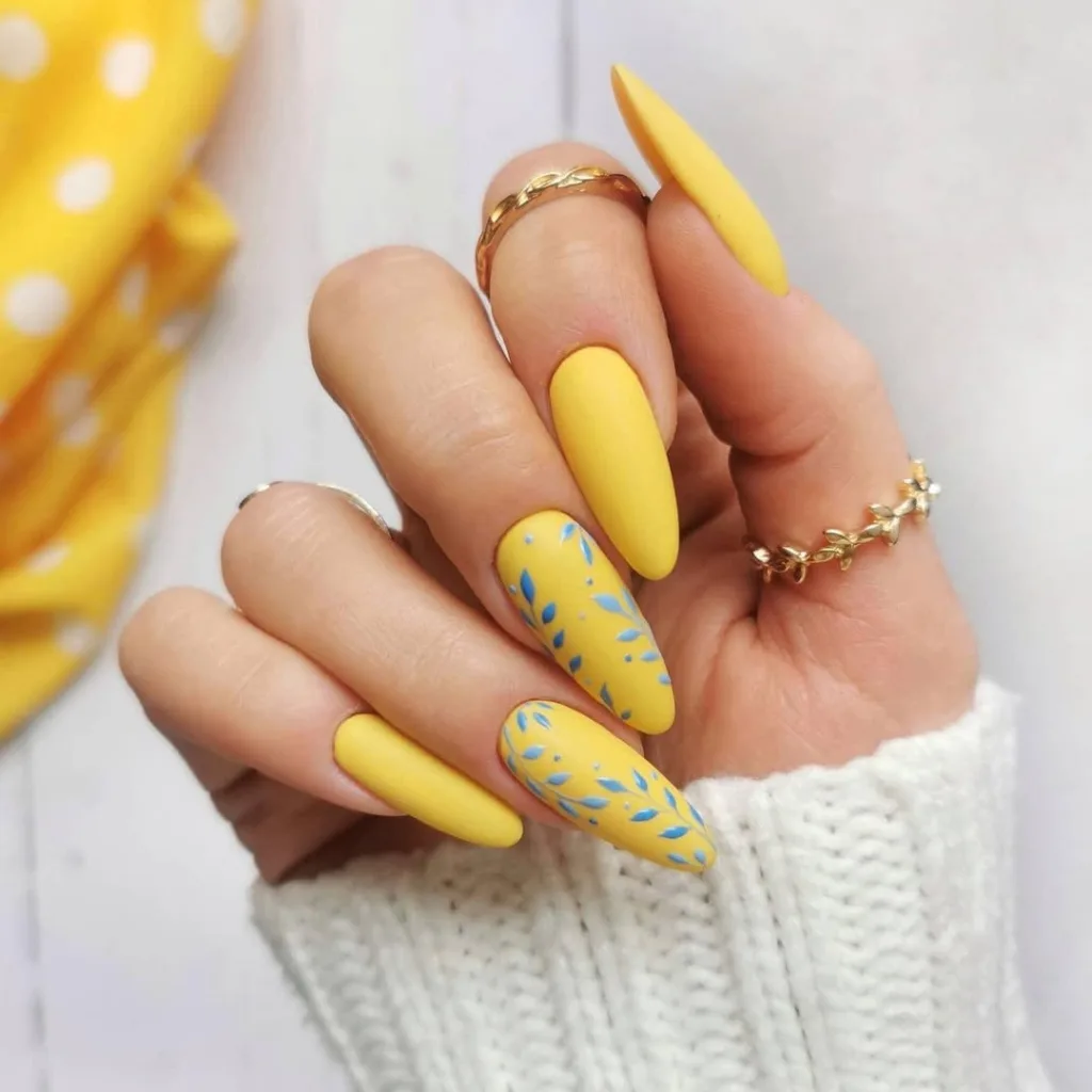 Long Round Yellow Nails with Blue Leaves