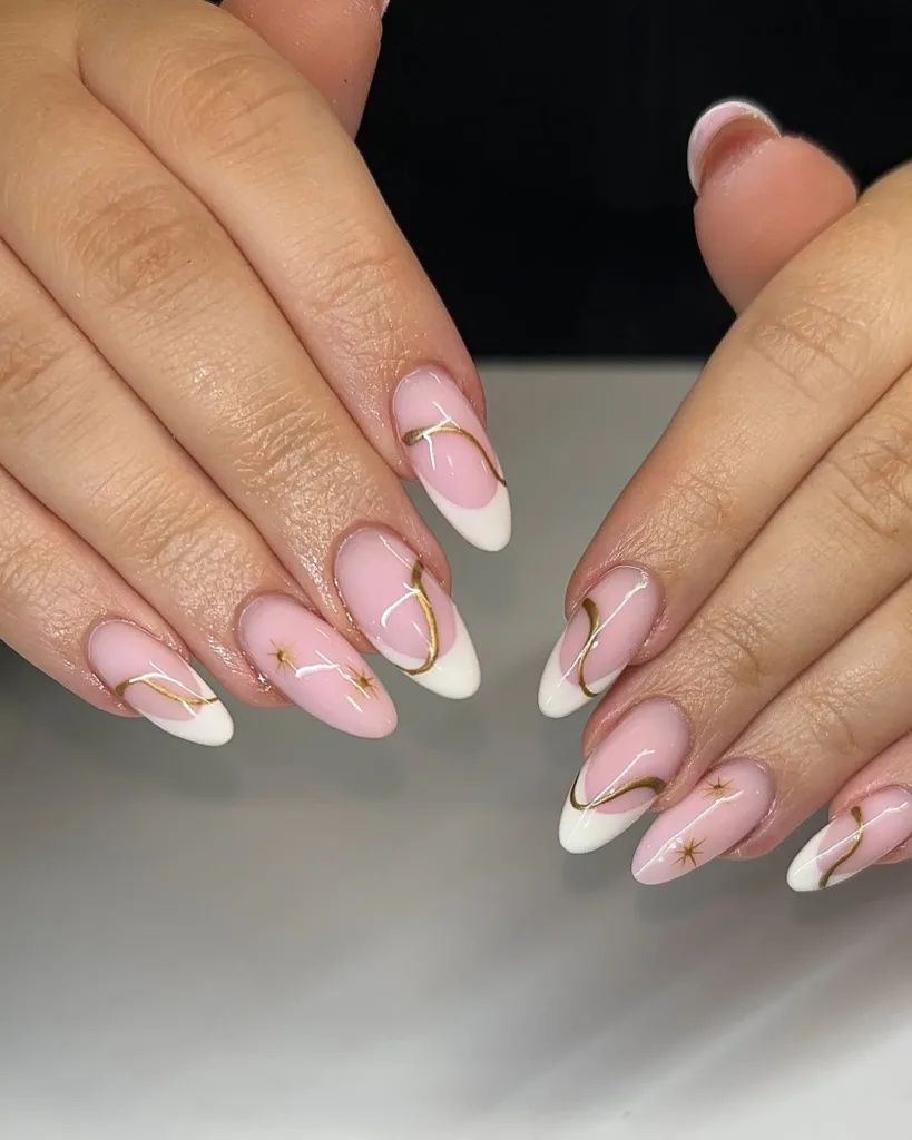 White Almond French Nails with Pink Base and Golden Abstract Designs