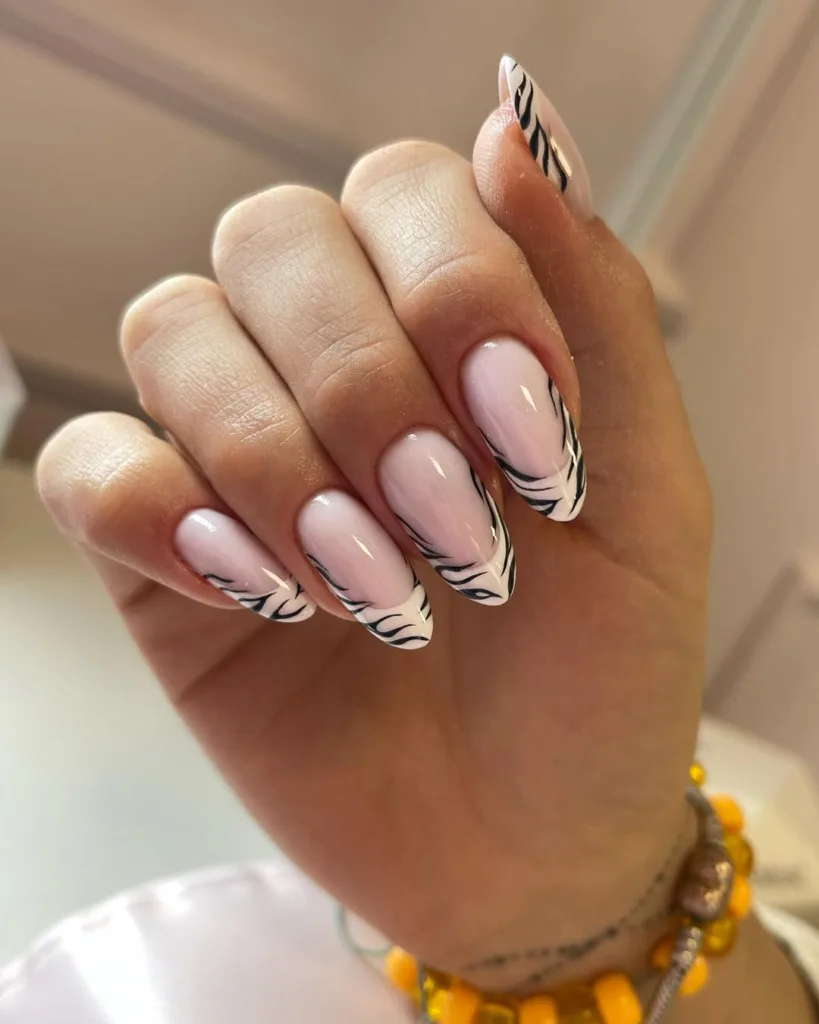 Zebra Print Black and White Almond French Nails