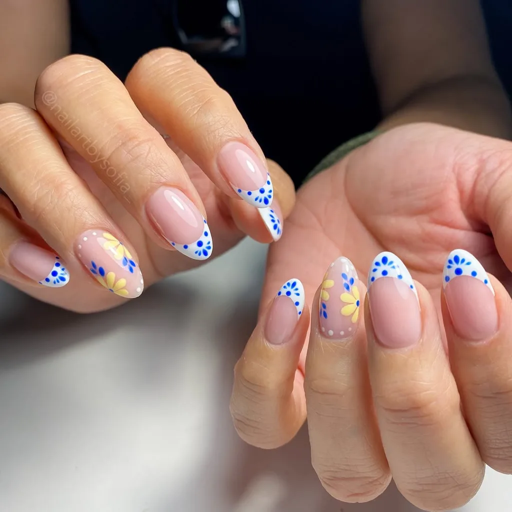 Blue and White French Tip Nails with yellow Flowers