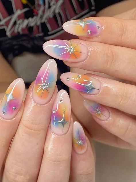 Taffy Pull Prism candy nails showcasing a jelly base with pastel splashes and white line art