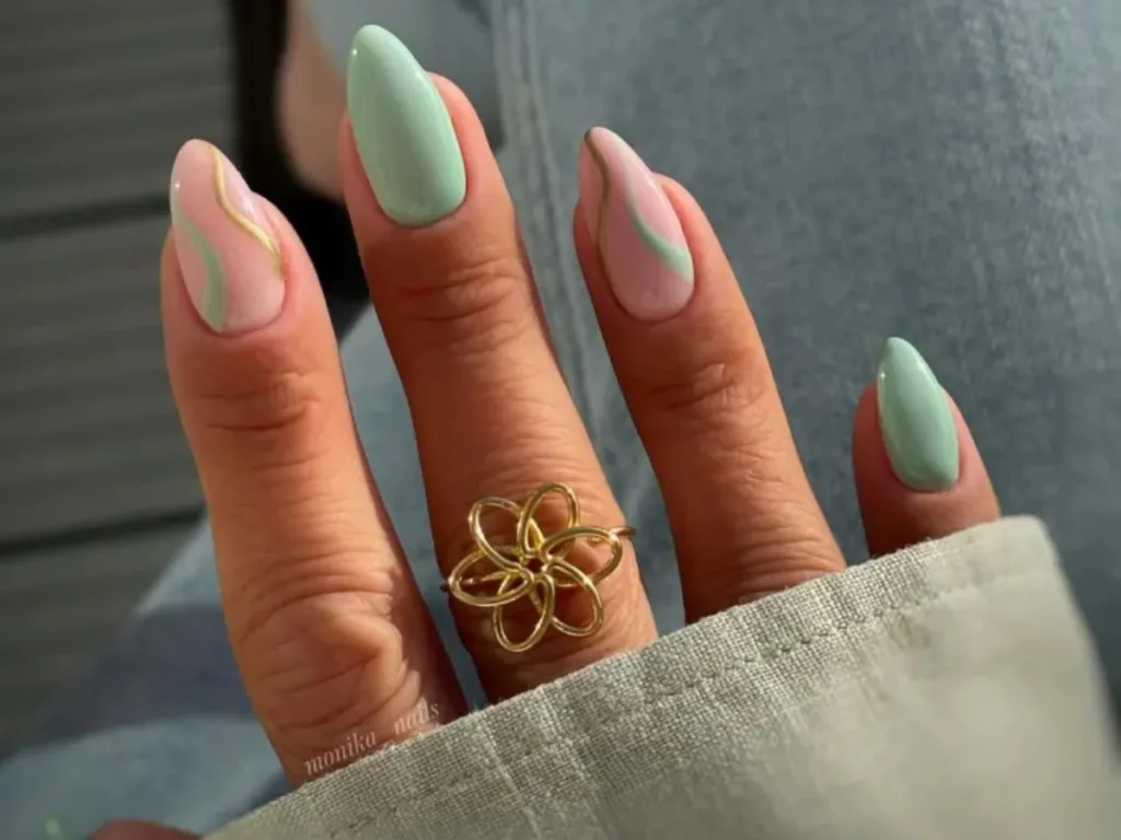 Long Stiletto Green French Tip Nails and Golden Charms